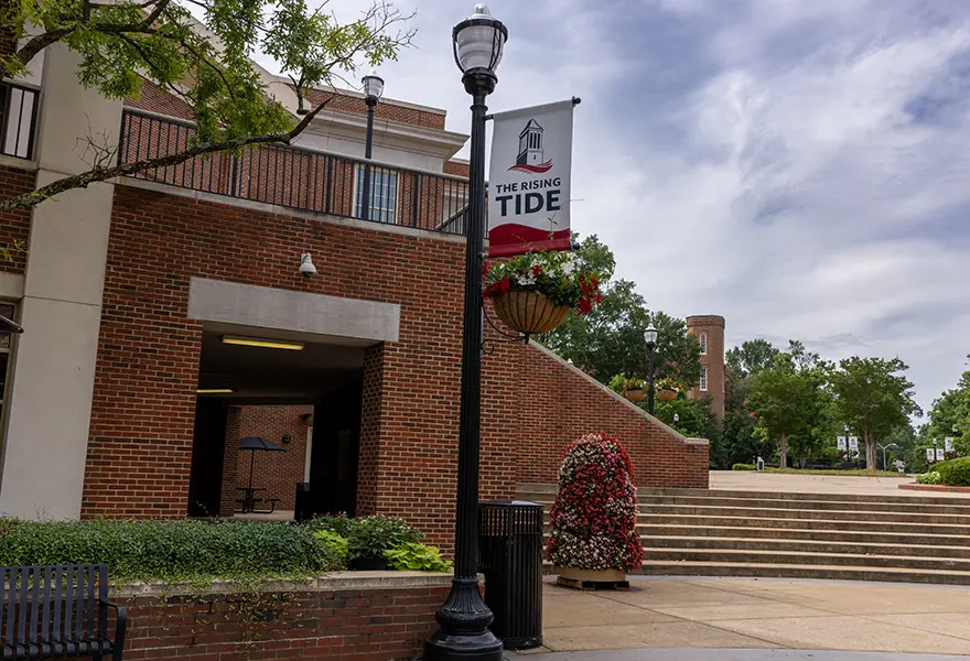 From the Starbucks/Supe Store entrance heading towards the Quad, take the tunnel below the stairs to the CSL entrance